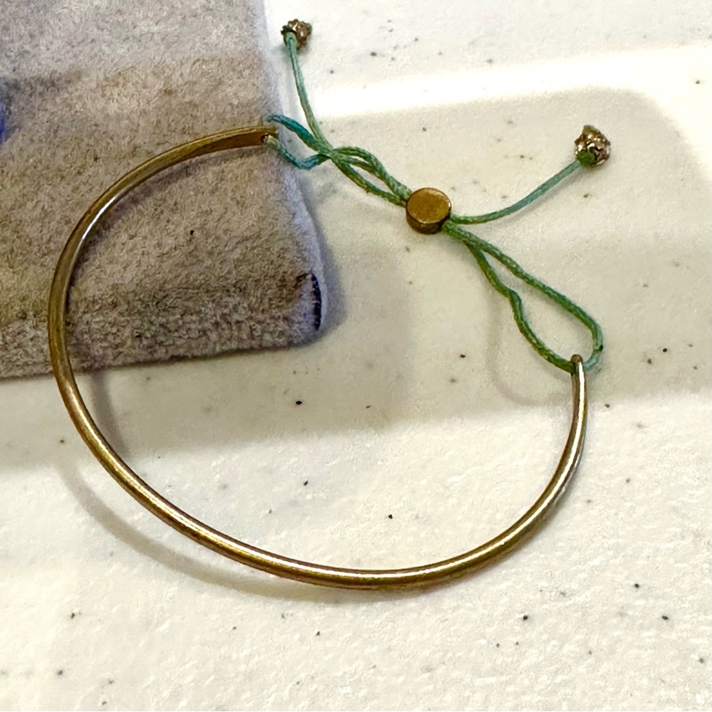 J. Crew Thin Cuff Bangle Bracelet antique gold w/ green string & rhinestones